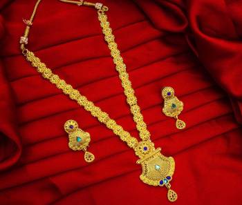 Give An Enhanced Look To Your Personality By Pairing Up This Beautiful Necklace Set With Your Ethnic Attire. This Pretty Set Is In Golden Color Beautified With Stone Work. Buy Now.