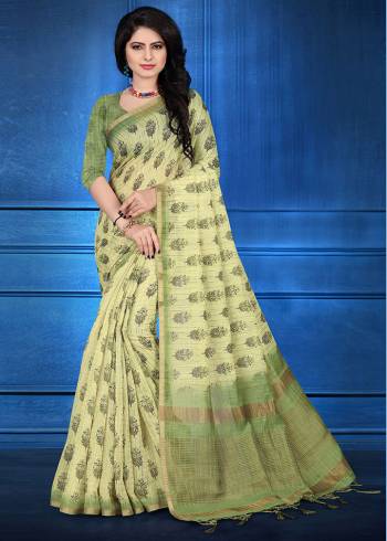 Here Is A Pretty Printed Saree For Your Semi-Casuals Or Festive Wear In Light Green Color. This Saree And Blouse Are Fabricated On Cotton Silk Beautified With Prints And Jari Checks. 