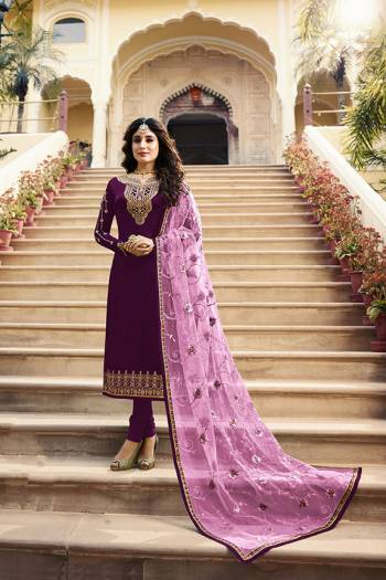 Grab This Very Beautiful Designer Straight Suit In Purple Color Paired With Pretty Embroidered Dark Purple Colored Dupatta. Its Top Is Fabricated On Satin Georgette Paired With Santoon Bottom and Net Fabricated Dupatta. Buy This Designer Embroidered Suit Now.