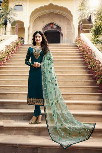 Grab This Very Beautiful Designer Straight Suit In Teal Blue Color Paired With Pretty Embroidered Pastel Green Colored Dupatta. Its Top Is Fabricated On Satin Georgette Paired With Santoon Bottom and Net Fabricated Dupatta. Buy This Designer Embroidered Suit Now.