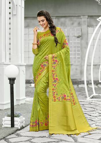 For A Proper Traditional Look, Grab This Designer Silk Based Saree In Parrot Green Color. This Saree Is Fabricated On Banarasi Silk Paired With Art Silk Fabricated Blouse, Beautified With Attractive Floral Weave. 