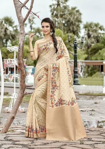 Add This Beautiful And Elegant Looking Saree To Your Wardrobe In Cream Color. This Pretty Floral Weaved Saree Is Fabricated On Banarasi Silk Paired With Art Silk Fabricated Blouse. 