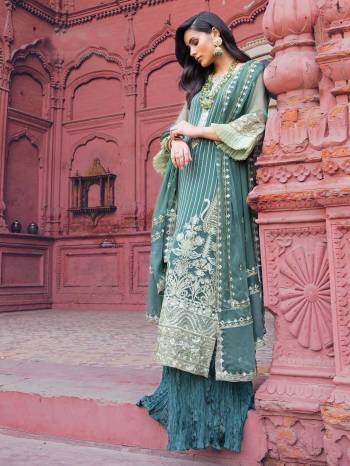 Grab This Heavy Designer Straight Suit In Teal Green Color. Its Top And Dupatta Are Fabricated On Georgette Paired With Santoon Bottom. It Is Beautified With Heavy Attractive Embroidery Over The Top. Buy Now.