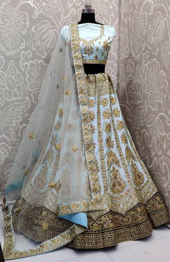 Here Is A Very Beautiful And Attractive Looking Heavy Designer Lehenga Choli In Sky Blue Color. Its Blouse Is Fabricated On Satin Silk Paired With Satin Silk And Velvet Fabricated Lehenga And Net Fabricated Dupatta. Buy Now.