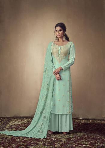 Here Is A Rich And Elegant Looking Designer Straight Suit In Sea Green Color. Its Elegant Top Is Fabricated On Banarasi Jacquard Paired With Satin Bottom And Georgette Fabricated Lakhnavi Embroidered Dupatta. Its Subtle Tone To Tone Embroidery Gives Rich And Elegant Look To Your Personality. 