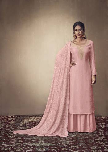 You Will Definitely Earn Lots Of Compliments Wearing This Designer Straight Suit In Light Pink Color. Its Weaved Top Is Fabricated Banarasi Jacquard Paired With Satin Fabricated Bottom And Georgette Fabricated Dupatta Which Is Beautified With Pretty Tone To Tone Lakhnavi Work. 