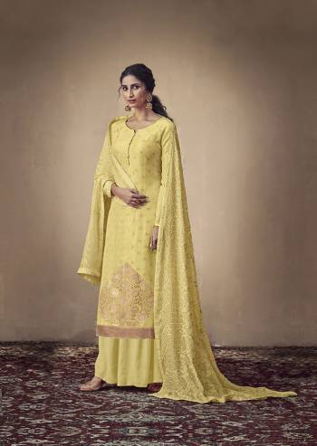 You Will Definitely Earn Lots Of Compliments Wearing This Designer Straight Suit In Yellow Color. Its Weaved Top Is Fabricated Banarasi Jacquard Paired With Satin Fabricated Bottom And Georgette Fabricated Dupatta Which Is Beautified With Pretty Tone To Tone Lakhnavi Work. 