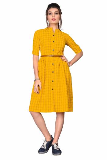 Here Is A Pretty Tunic Patterned Kurti In Yellow Color. This Readymade Kurti Is Fabricated On Cotton Beautified With Checks Prints. Its Fabric Is Light Weight And Easy To Carry All Day Long. 