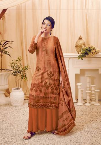 Add This Beautiful Designer Straight Suit In Light Brown Color. Its Pretty Top, Bottom And Dupatta Are Fabricated On Wool Pashmina Beautified With Prints And Stone Work. Its Fabric Is Soft Towards Skin And Suitable For The Upcoming Winters. 