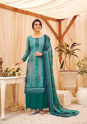 Look Pretty Wearing This Lovely Suit For The Upcoming Winters In Blue Color. Its Top, Bottom And Dupatta Are Fabricated On Wool Pashmina Beautified With Prints And Stone Work. Buy This Suit Now.