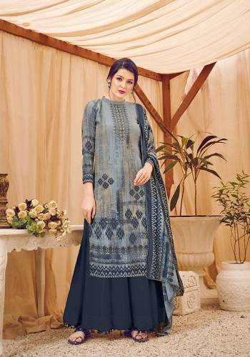 Add This Beautiful Designer Straight Suit In Dark Grey Color. Its Pretty Top, Bottom And Dupatta Are Fabricated On Wool Pashmina Beautified With Prints And Stone Work. Its Fabric Is Soft Towards Skin And Suitable For The Upcoming Winters. 