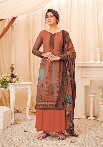 Look Pretty Wearing This Lovely Suit For The Upcoming Winters In Rust Color. Its Top, Bottom And Dupatta Are Fabricated On Wool Pashmina Beautified With Prints And Stone Work. Buy This Suit Now.