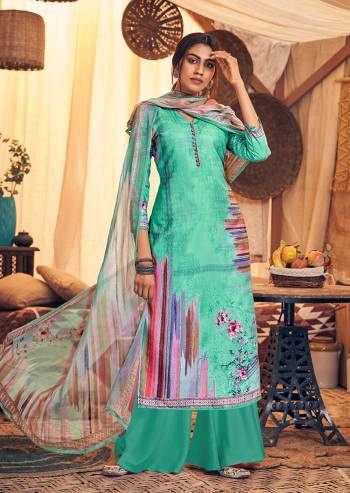 Get Ready For The Upcoming Winters Wearing This Designer Straight Suit In Sea Green Color. Its Pretty Top And bottom Are Fabricated On Wool Pashmina Paired With Chiffon Fabricated Dupatta. It Is Beautified with Prints And Stone Work.