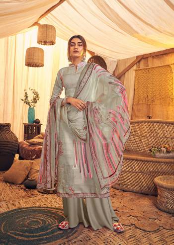 Here Is A Very Pretty And Trendy Straight suit In Grey Color. Its Top And Bottom Are Fabricated On Wool Pashmina Paired With Chiffon Based Dupatta, This Pretty Suit Is Suitable For The Upcoming Winters, Buy Now.