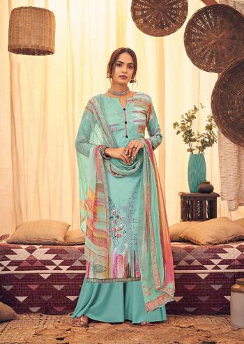 Here Is A Very Pretty And Trendy Straight suit In Sky Blue Color. Its Top And Bottom Are Fabricated On Wool Pashmina Paired With Chiffon Based Dupatta, This Pretty Suit Is Suitable For The Upcoming Winters, Buy Now.