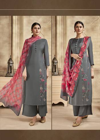 Grab This Very Beautiful And Elegant Looking Designer Straight Suit In Grey Color Paired With Dark Pink Colored Dupatta. Its Pretty Elegant Embroidered Top Is Fabricated On Satin Silk Paired With Santoon Bottom and Viscose Muslin Fabricated Printed Dupatta. 