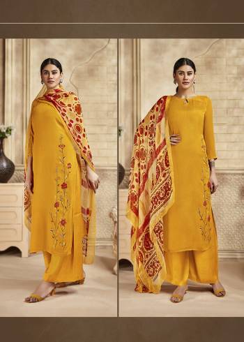 Here Is A Pretty Designer Straight Suit Suitable For The Upcoming Festive Season In This Lovely Yellow Color Paired With Red And Yellow Colored Dupatta. Its Top Is Fabricated On Saton Silk Beautified With Minimal Elegant Embroidery Paired With Santoon Bottom and Viscose Muslin Printed Dupatta. Buy this Pretty Suit Now.