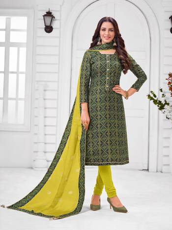 Grab This Designer Straight Suit For Your Semi-Casual Wear In Dark Green Color Paired With Parrot Green Colored Bottom and Dupatta. Its Top and Dupatta Are Chanderi Based Paired With Cotton Bottom. 