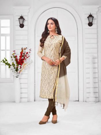 Simple And Elegant Looking Designer Straight Suit Is Here In Cream Color Paired With Brown Colored bottom And Dupatta. Its Top Is Fabricated On Modal Silk Paired With Cotton Bottom and Chanderi Cotton Dupatta. 