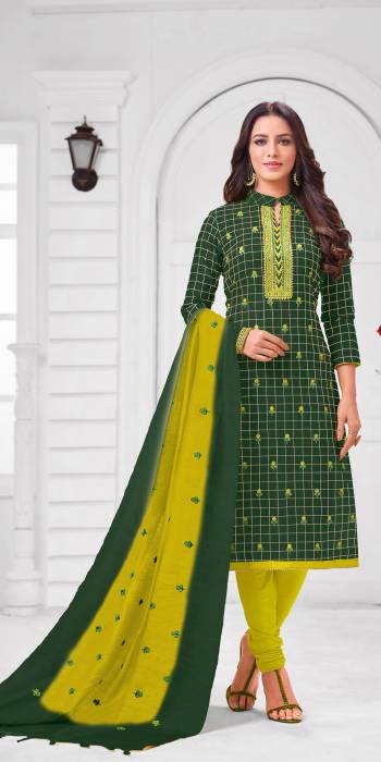 Add This Pretty Suit To Your Wardrobe In Dark Green colored Top Paired With Contrasting Parrot Green Colored Bottom and Dupatta. Its Top Is Fabricated On Modal Silk Paired With Cotton Bottom and Dupatta. 