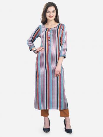 Add This Pretty Kurti To Your Wardrobe In Blue Color. This Readymade Kurti Is Fabricated On Rayon With Lining Prints. It Is Light In Weight And Easy To Carry All Day Long .