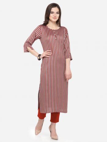 For Your Casual Wear, Grab This Pretty Readymade Straight Kurti In Maroon Color Fabricated On Rayon. This Kurti Can Be Paired With Same Or Contrasting Colored Pants, Leggings Or Plazzo.