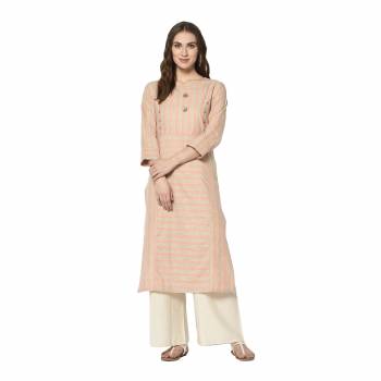 Add This Pretty Kurti To Your Wardrobe In Peach Color. This Readymade Kurti Is Fabricated On Cotton With Lining Prints. It Is Light In Weight And Easy To Carry All Day Long .