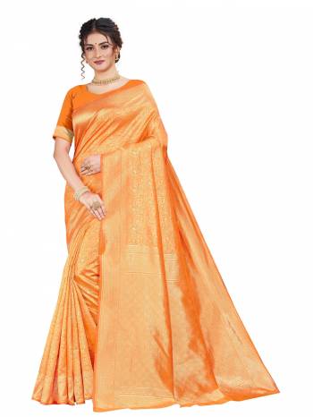 Here Is An Attractive Looking Heavy Weaved Designer Saree In Orange Color. This Saree and Blouse Are Fabricated On Art Silk Beautified With Detailed Weave. Buy Now.