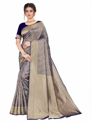 Here Is An Attractive Looking Heavy Weaved Designer Saree In Navy Blue Color. This Saree and Blouse Are Fabricated On Art Silk Beautified With Detailed Weave. Buy Now.