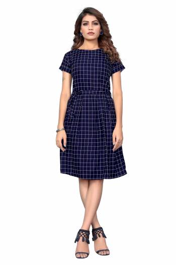 Here Is A Pretty Tunic Patterned Readymade Kurti In Navy Blue Color Fabricated On Crepe. This Pretty Kurti Is Beautified With Prints And Can Be Wore As A One Piece And Also Can Be Paired With Bottom. 