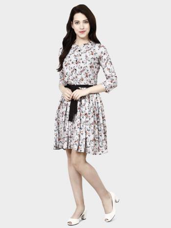 Look Like A Diva Wearing This Pretty Tunic Patterned Readymade Kurti In Light Grey Color. This Printed Kurti Is Fabricated On Crepe Which Is Light Weight, Soft and Easy To Carry All Day Long. 