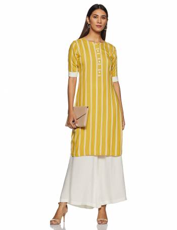 Here Is A Very Pretty And Elegant Looking Kurti In Yellow Color Paired With White Colored bottom. Its Fabric Is Soft Towards Skin And Ensures Superb Comfort All Day Long.