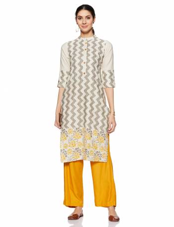 Here Is A Very Pretty And Elegant Looking Kurti In Light Grey Color. Its Fabric Is Soft Towards Skin And Ensures Superb Comfort All Day Long.