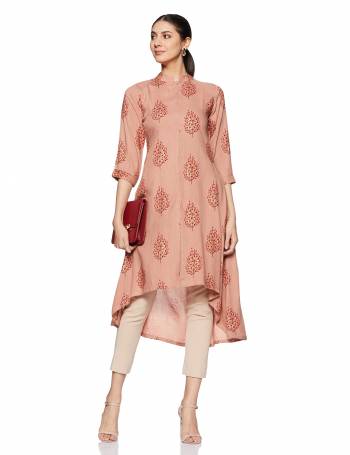 Be It Your College, Home Or Work Place, This Pretty Readymade Kurti Is Suitable For All. Its Elegant Peach Color And Light Weight Fabric Gives Rich Look To Your Personality. Buy Now.