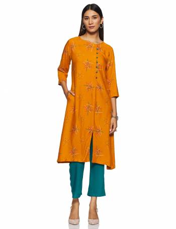 Simple And Elegant Looking Regular Wear Readymade Kurti Is Here In Orange Color Paired With Teal Blue colored bottom. This Kurti Is Light In Weight And Its Fabric Is Durable And Easy To Care For. 