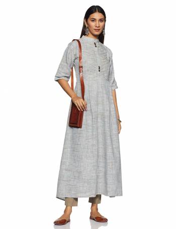 Here Is A Very Pretty And Elegant Looking Kurti In Grey Color Paired With White Colored bottom. Its Fabric Is Soft Towards Skin And Ensures Superb Comfort All Day Long.