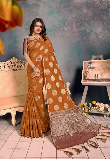 For A Proper Traditional Look, Grab This Pretty Designer Saree In?Brown Color. This Saree Is Chanderi Silk Based Beautified With Detailed Attractive Weave Paired With Art Silk Fabricated Blouse. Buy Now.