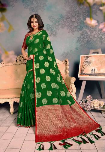 Shine Bright Wearing This Rich Silk Based Designer Saree In?Green Color. This Saree Is Fabricated On Chanderi Silk Paired With Art Silk Fabricated Blouse. It Is Beautified With Heavy Detailed Weaved Giving An Attractive Look?