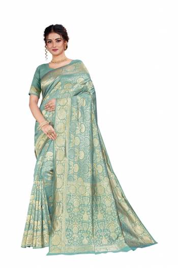 Here Is An Attractive Looking Heavy Weaved Designer Saree In Dusty Blue Color. This Saree and Blouse Are Fabricated On Art Silk Beautified With Detailed Weave. Buy Now.