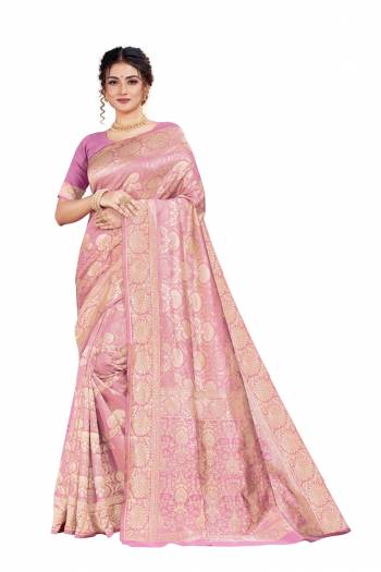 Celebrate This Festive Season With Beauty And Comfort Wearing This Designer Silk Based Saree In Light Pink Color. This Saree And Blouse Are Fabricated on Art Silk Beautified With Heavy Weave. 