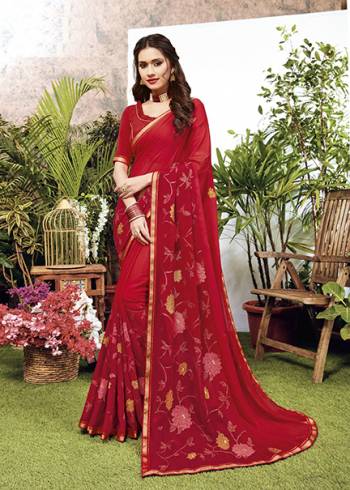 Look Pretty Wearing This Elegant Looking Designer Saree In Red Color. This Pretty Saree Is Fabricated On Georgette Paired With Art Silk Fabricated Blouse. It Is Light In Weight And Easy To Carry All Day Long. 