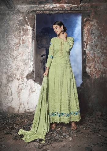 Grab This Heavy Designer Floor Length Suit Is In Attractive Pastel Green Color. Its Heavy Embroidered Top Is Fabricated On Georgette Paired With Santoon Bottom And Chiffon Fabricated Dupatta. Buy This Lovely Lakhnavi Embroidered Floor Length Suit Now.