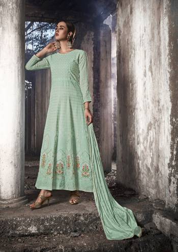 Grab This Heavy Designer Floor Length Suit Is In Attractive Pastel Blue Color. Its Heavy Embroidered Top Is Fabricated On Georgette Paired With Santoon Bottom And Chiffon Fabricated Dupatta. Buy This Lovely Lakhnavi Embroidered Floor Length Suit Now.