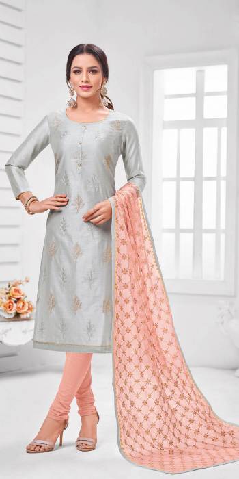 Simple And Elegant Looking Designer Straight Suit Is Here In Grey Color Paired With Light Peach Colored bottom And Dupatta. Its Top Is Fabricated On Modal Silk Paired With Cotton Bottom and Orgenza Cotton Dupatta.?