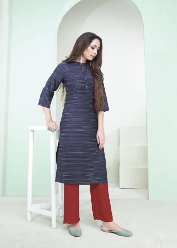 Here Is A Pretty Simple Lining Printed Readymade Kurti In Navy Blue Color. This Pretty Kurti Is Fabricated On Cotton And It Can Be Paired With Pants, Plazzo Or Leggings. Also It Is Available In All Regular Sizes. Buy Now.