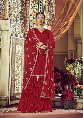 Adorn The Pretty angelic Look Wearing This Bright And Beautiful Red Colored Designer Sharara Suit. This Pretty Suit Is Georgette Based Paired With Chiffon Fabricated Dupatta. Its Minimal Embroidery and Bright Give A Balaced Look. 