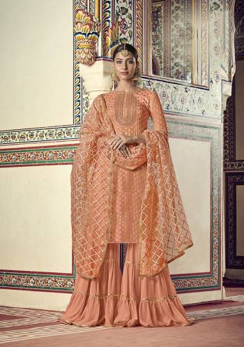 Look Pretty In This Designer Sharara Suit In Peach Color. Its Top Is Fabricated On Jacquard Georgette Paired with Georgette Bottom and Net Fabricated Dupatta Beautified With Gota Patti Work.