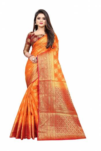 Celebrate This Festive Season In A Proper Traditonal Look Wearing This Silk Based Saree In Orange Color Paired With Red Colored Blouse. This Saree And Blouse Are Fabricated On Art Silk Beautified with Weave. 