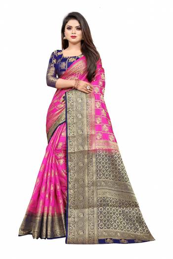 Grab This Beautiful Designer Weaved Saree In Rani Pink color Paired With Royal Blue Colored Blouse. This Saree And Blouse Are Fabricated On Art Silk Which Also Gives A Rich Look To Your Personality. 