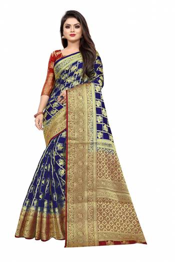 Celebrate This Festive Season In A Proper Traditonal Look Wearing This Silk Based Saree In Royal Blue Color Paired With Red Colored Blouse. This Saree And Blouse Are Fabricated On Art Silk Beautified with Weave. 